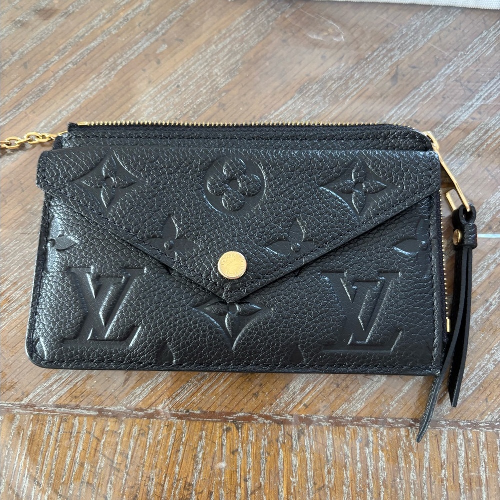 Authentic Louis Vuitton Black Embossed Leather Wristlet